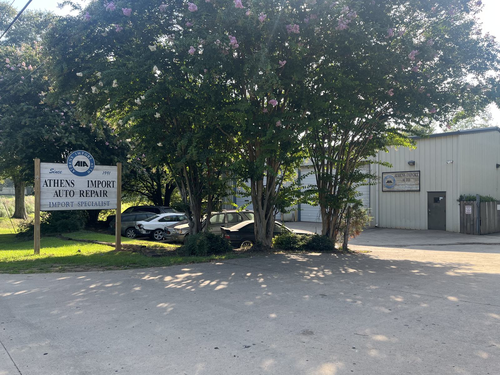 Parking lot and street sign at Athens Import Auto Repair, 835 Winterville Rd